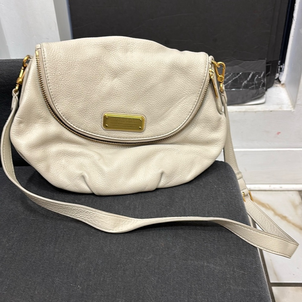 Bag is from a smoke free environment with Wallet